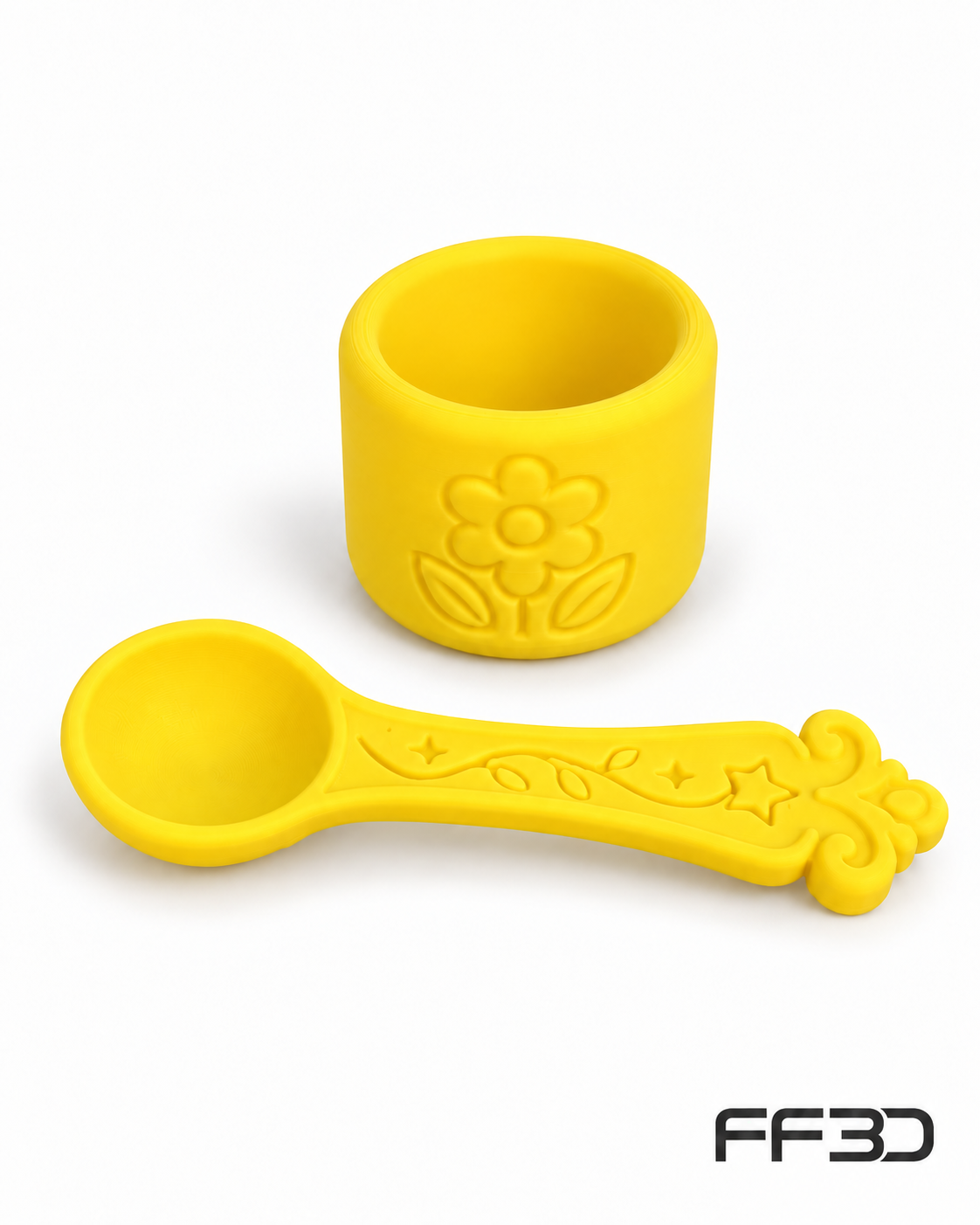 Yellow embossed cup and decorative spoon